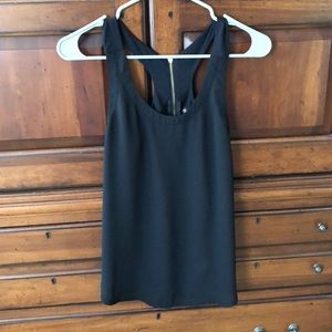 black tank top with gold zipper in back